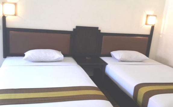 Tampilan Bedroom Hotel di The Flora Kuta Bali Hotel