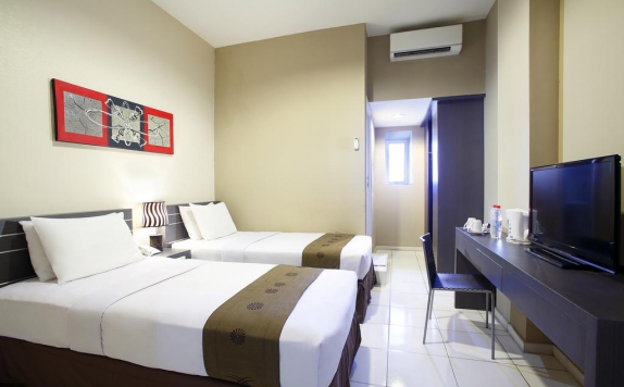 Kamar Tidur di The Sunset Point Hotel