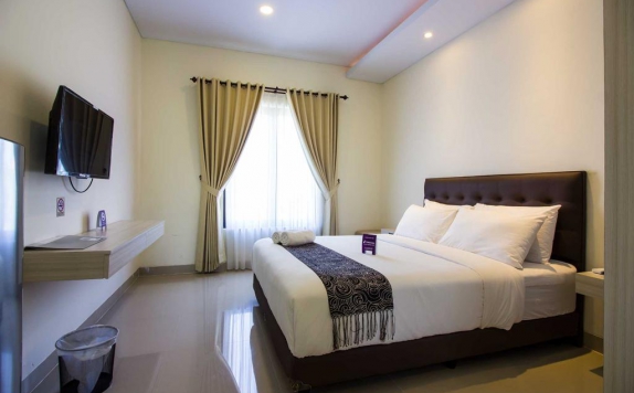 Tampilan Bedroom Hotel di Tri Homestay Kuta