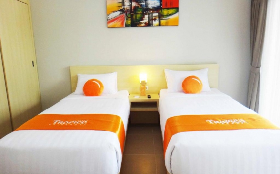 Kamar tidur di Tropico Jimbaran by Orange