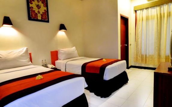 guest room twin bed di Yani Hotel