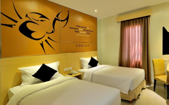 guest room twin bed di Zodiak Asia Afrika