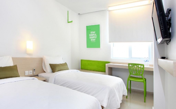 guest room twin bed di Zuri Express Palembang