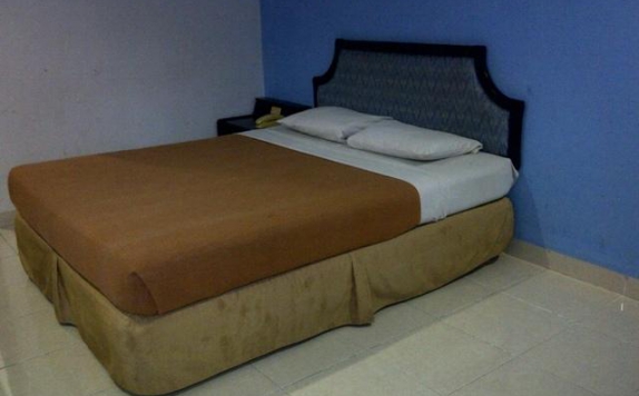 Tampilan Bedroom Hotel di Amans Inn