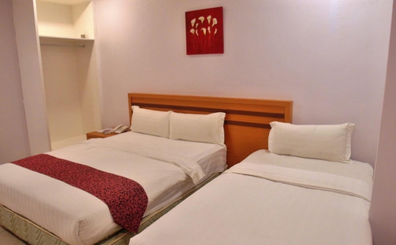 kamar tidur di Anugrah Transit Hotel