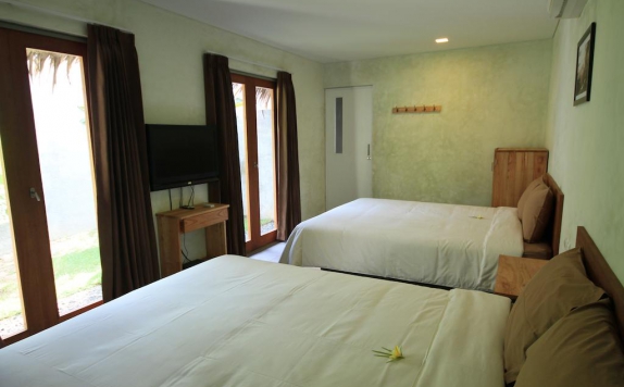 Guest room di Bale Karang Beach Cottages