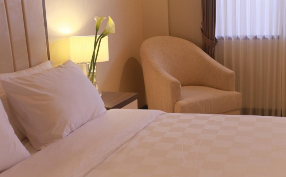 Tampilan Bedroom Hotel di Bella Hotel by Simply Maven