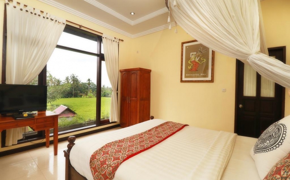 Tampilan Bedroom Hotel di Bisma Cottages Ubud