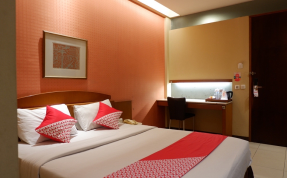 Tampilan Bedroom Hotel di Capital O 874 Hotel Nyland Pasteur