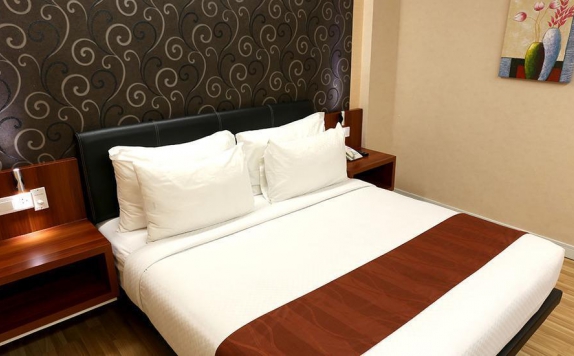 Tampilan Bedroom Hotel di Citihub Hotel Gejayan
