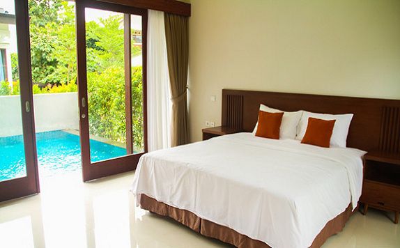 Bedroom di Countrywoods Residences