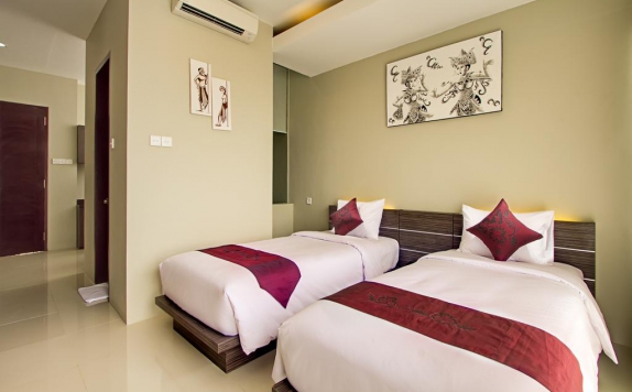 Bedroom di DenBukit Residence & Suite