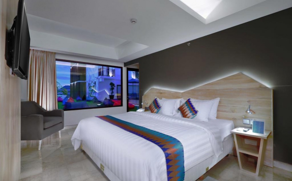 Tampilan Bedroom Hotel di Dmax Hotel & Convention Lombok