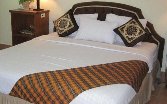 Kamar tidur di Dymens Hotel International