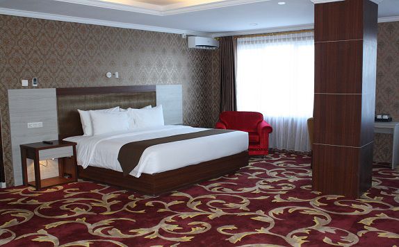 Bedroom di Grand Asrilia Hotel Convention & Restaurant