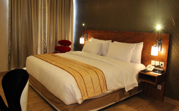 Bedroom di Hariston Hotel & Suites