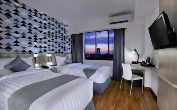 guest room twin bed di Hotel Neo Seminyak Petitenget