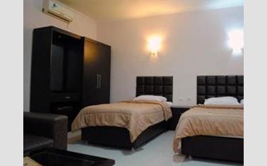 Kamar tamu di Hotel Sepuluh Lingkar Selatan