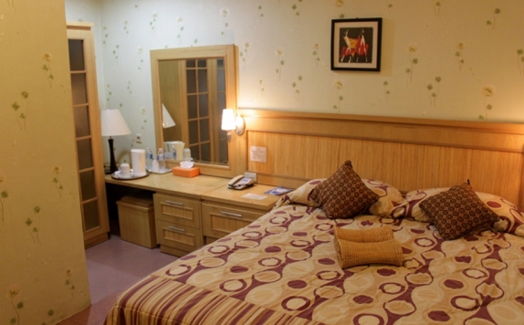 kamar tidur di Jelita Hotel