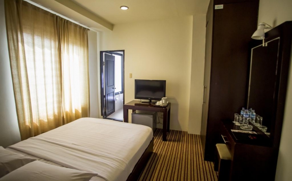 Bedroom di Kenari Tower Hotel