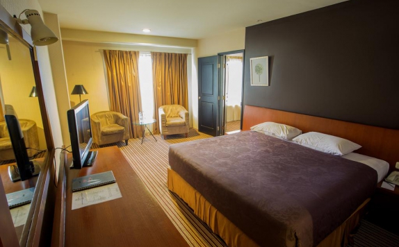 Bedroom di Kenari Tower Hotel