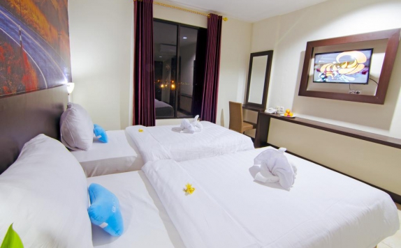 Tampilan Bedroom Hotel di Kyriad Grand Master Hotel Purwodadi
