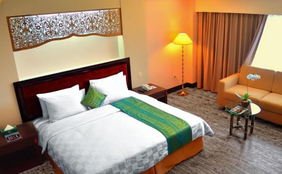 kamar tidur di Kyriad Hotel Bumiminang