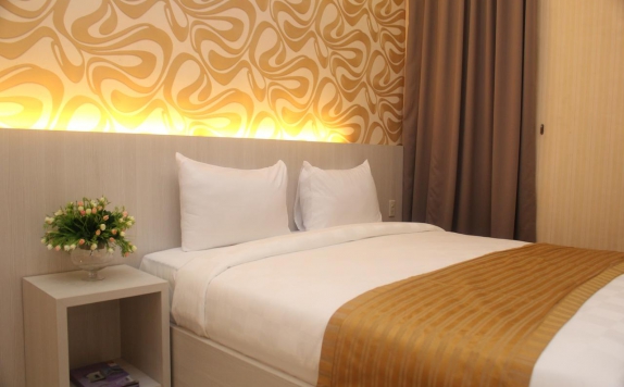 kamar tidur di LJ Hotel Medan
