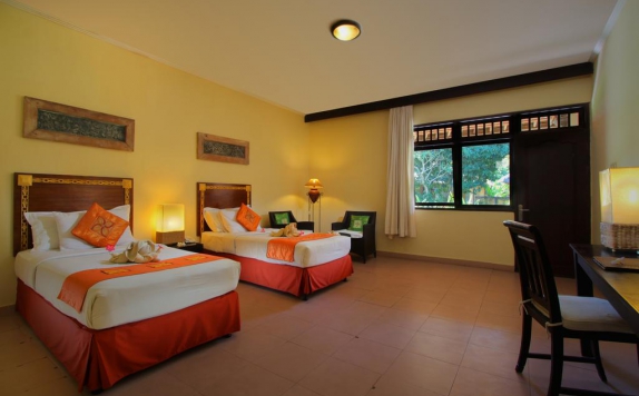 Kamar Tidur di Matahari Terbit Resort & Spa