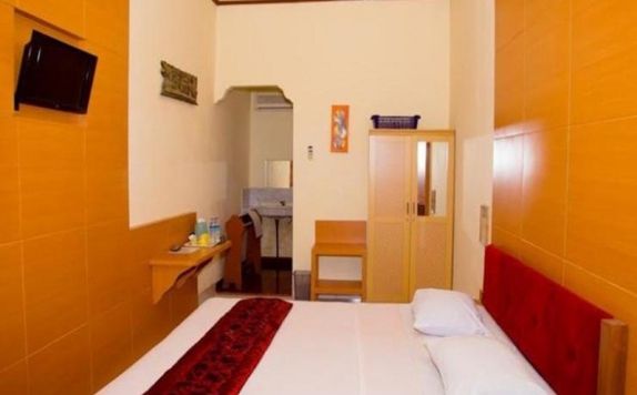 kamar tidur di Mataram Hotel