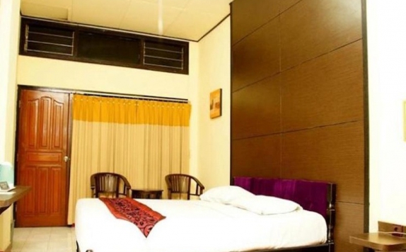 kamar tidur di Mataram Hotel