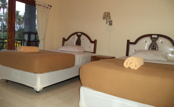 kamar tidur di My Lovina Hotel
