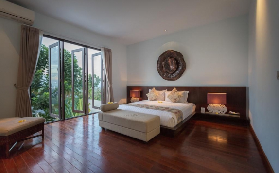 Bedroom di Nagisa Bali Bay View Villas