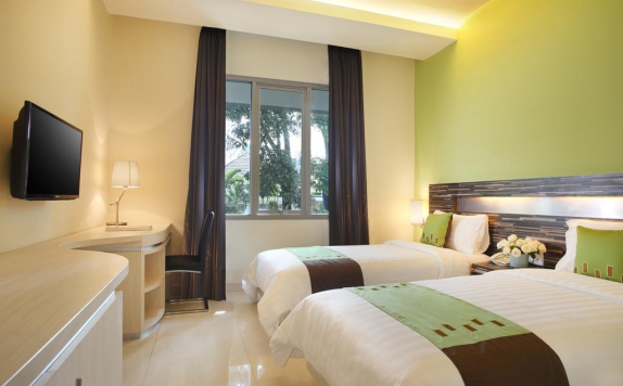 kamar tidur di Patra Jasa Hotel