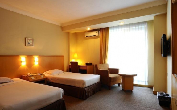 Interior bedroom di Perdana Wisata hotel