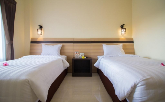 Tampilan Bedroom Hotel di Puri Indah Hotel Subak