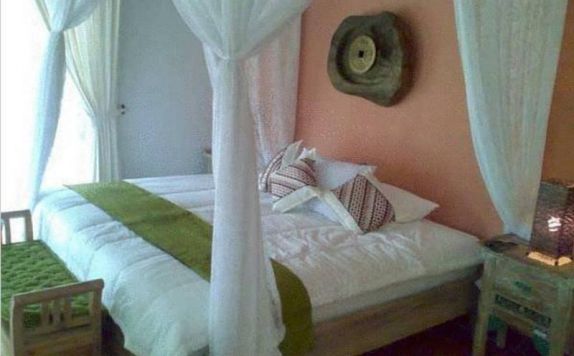 Kamar Tidur di Puri Taman Sari Hotel