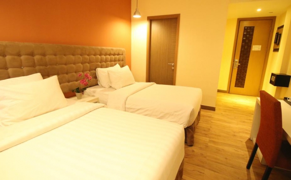 Tampilan Bedroom Hotel di Rivavi Fashion Hotel