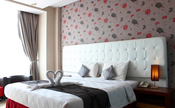 Tampilan Bedroom Hotel di Rizen Premiere Hotel
