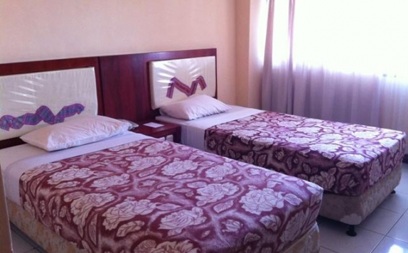 guest room twin bed di Sasando Hotel Kupang