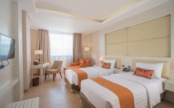 guest room twin bed di SOTIS HOTEL KUPANG
