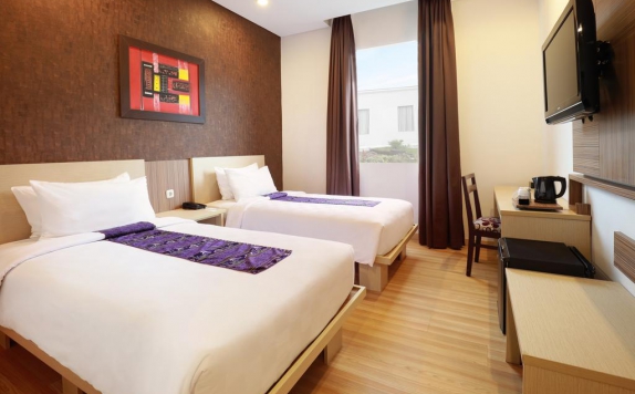 guest room twin bed di Swiss-Belinn Panakkukang Makassar