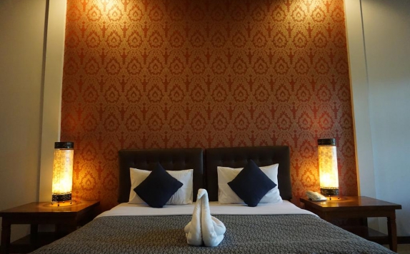Bedroom di Taman Harum Cottages Hotel