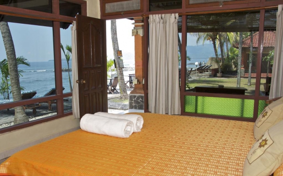 Tampilan Bedroom Hotel di Temple Cafe and Seaside Cottages