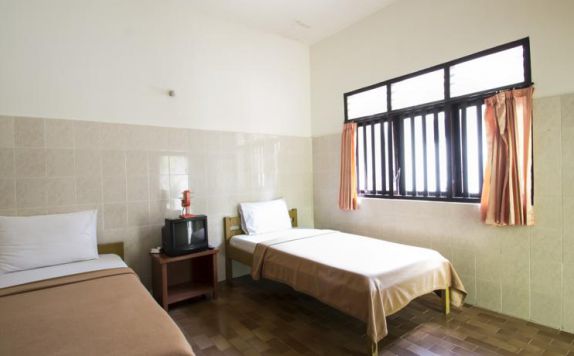 guest room twin bed di The Kodja Beach Resort