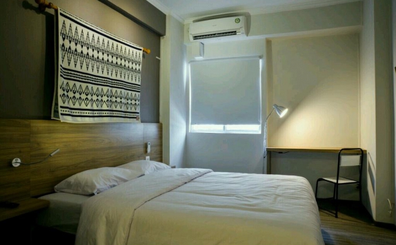 Guest Room di The Suites Metro by EMJI Group