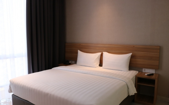 Bedroom di TravelHub Hotel