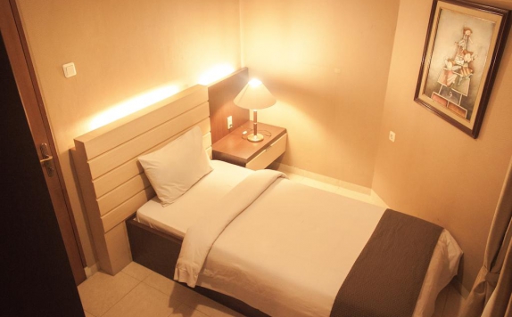 Guest room di Travellers Suites