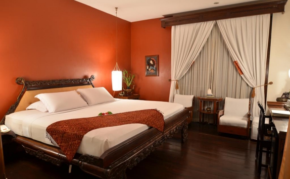 kamar tidur di Tugu Malang Hotel