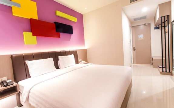 bedroom di Zoom Dharmahusada Hotel